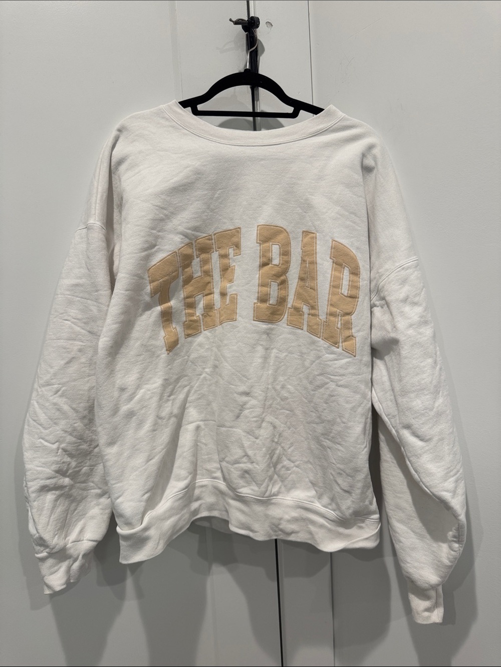 The Bar White Crewneck Sweatshirt with Tan Lettering